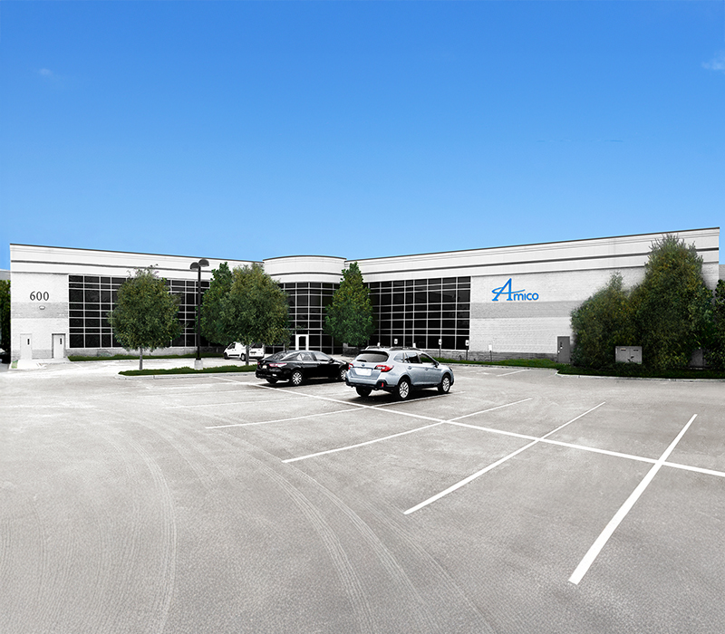 Amico Industrial headquarters building with parking lot